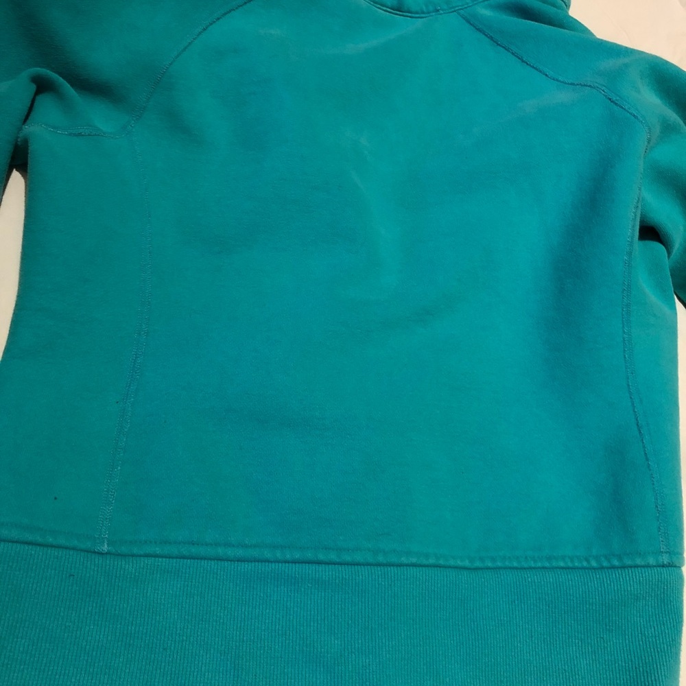 Small light teal Lululemon jacket